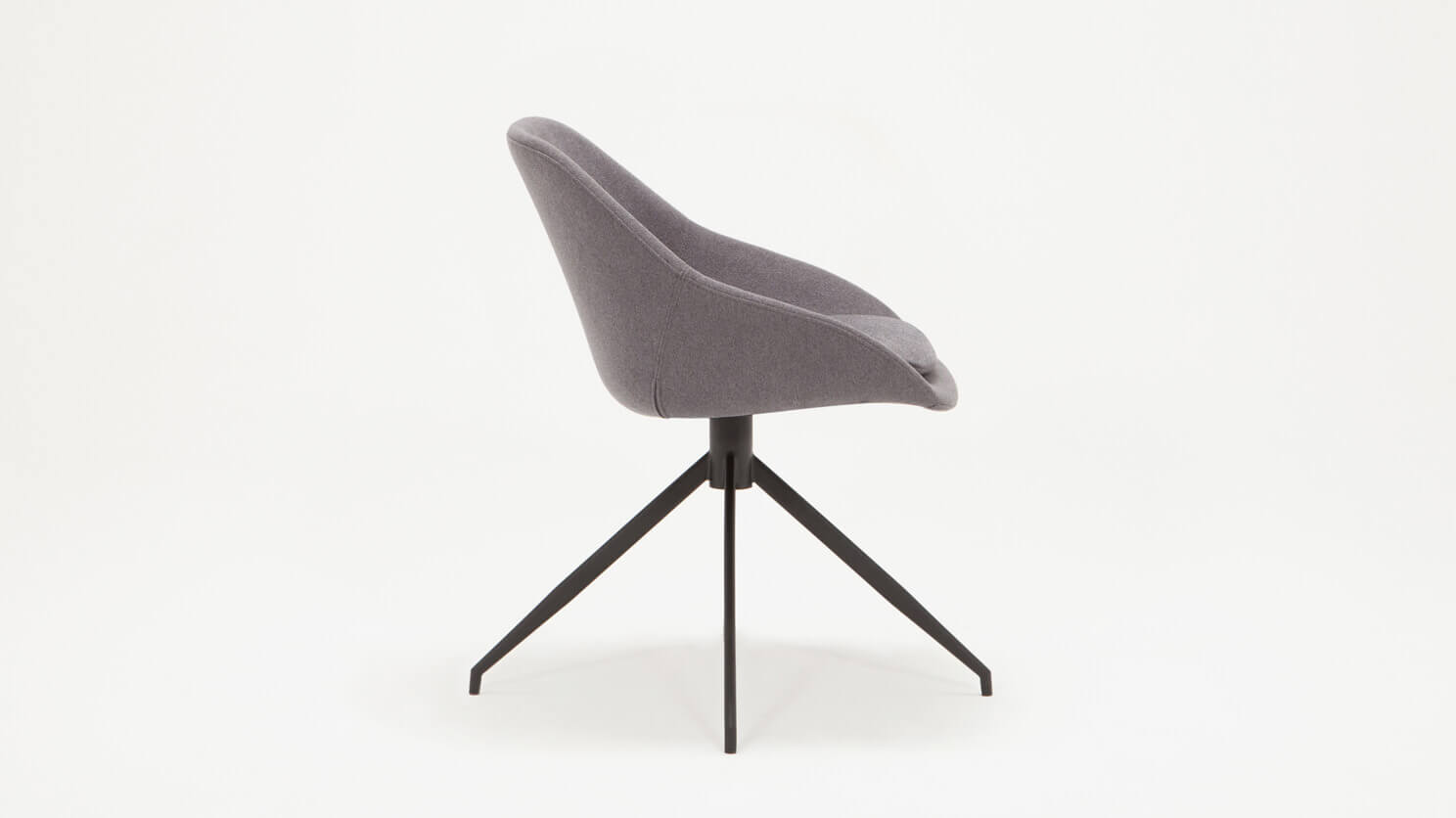 Side view of the Nixon upholstered dining chair in gray fabric