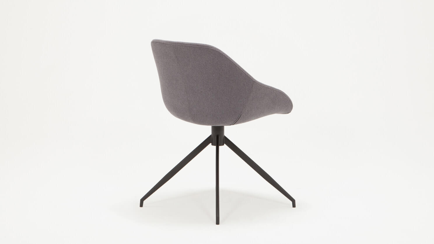 Back angled view of the Nixon upholstered dining chair in gray fabric