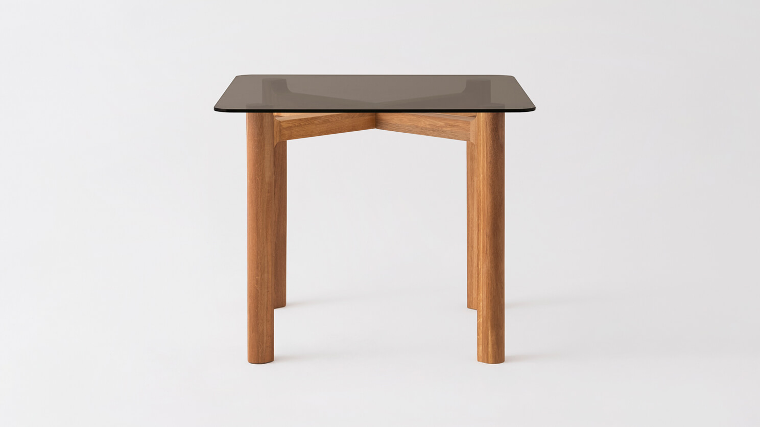 Front view of the Place square contemporary dinette table with brown glass top and oak legs