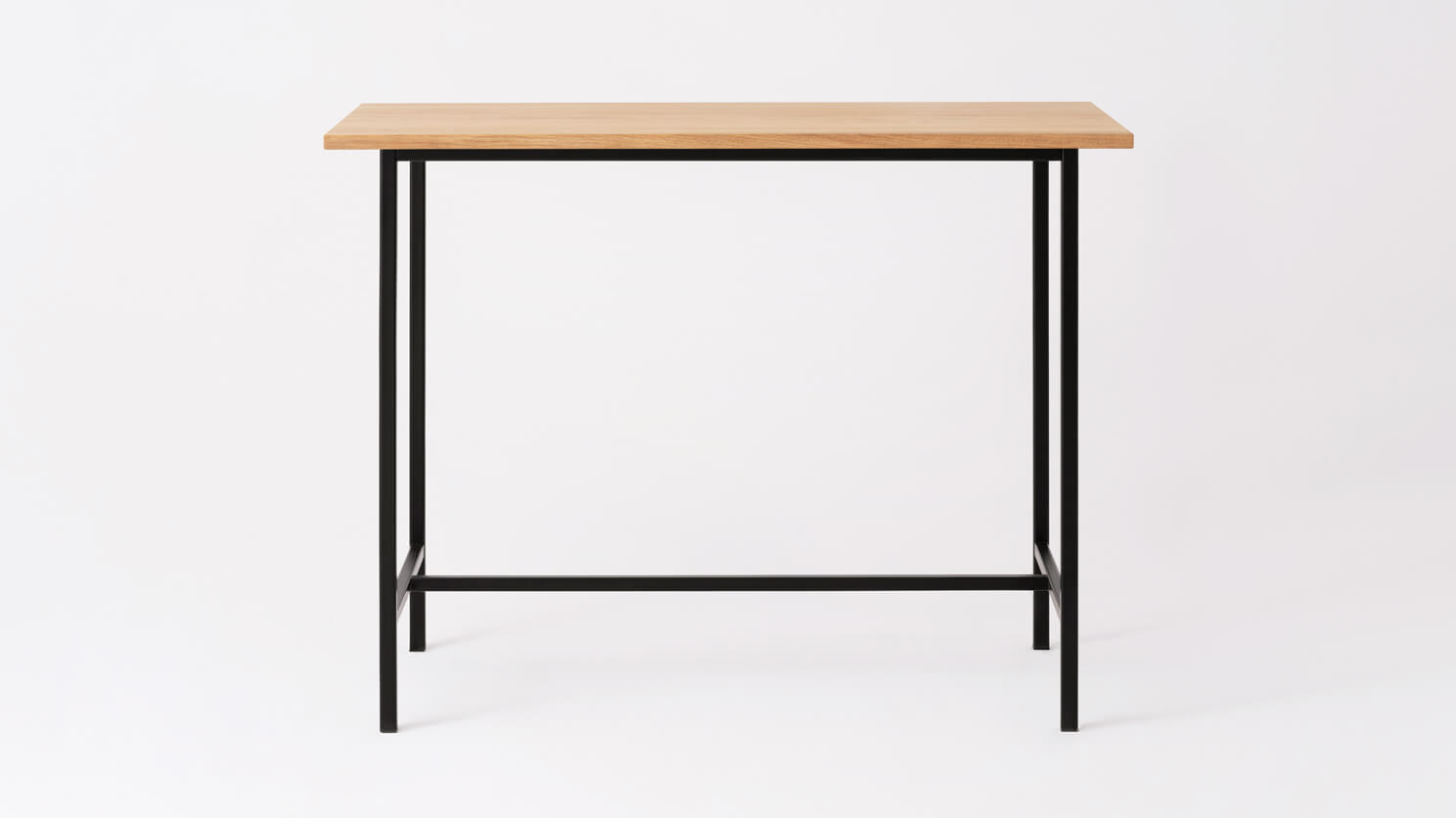 Front view of the Kendall bar height table with solid oak veneer top and black base