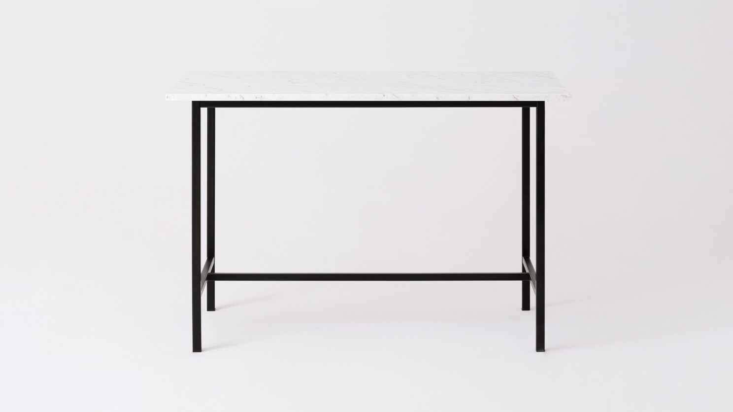 Front view of the Kendall custom counter table with marble top and black base
