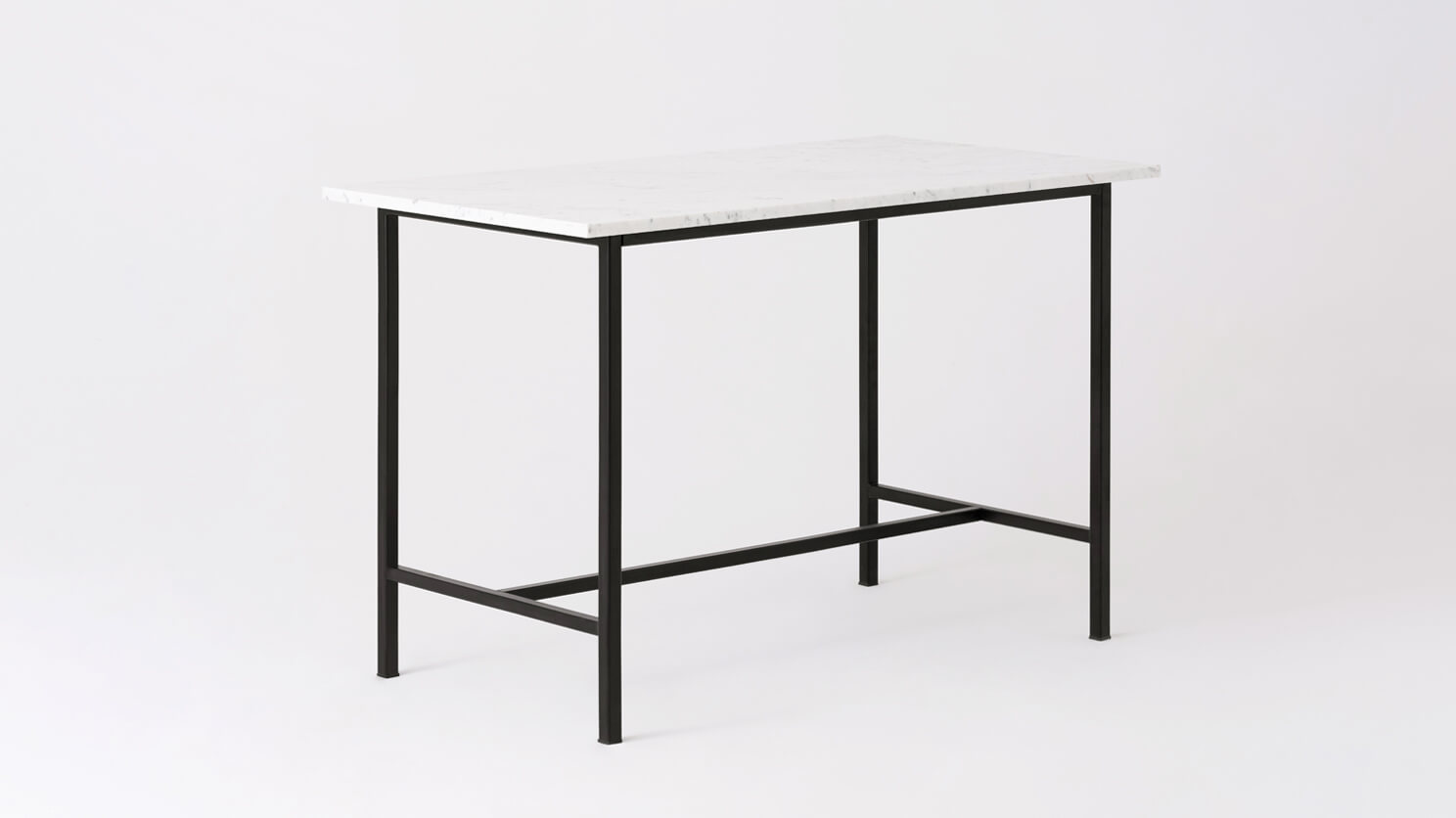 Angled view of the Kendall modern counter table with marble top and black base