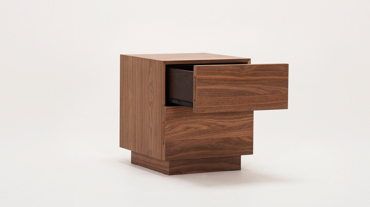 Angled view of the Boom modern accent table with drawer open