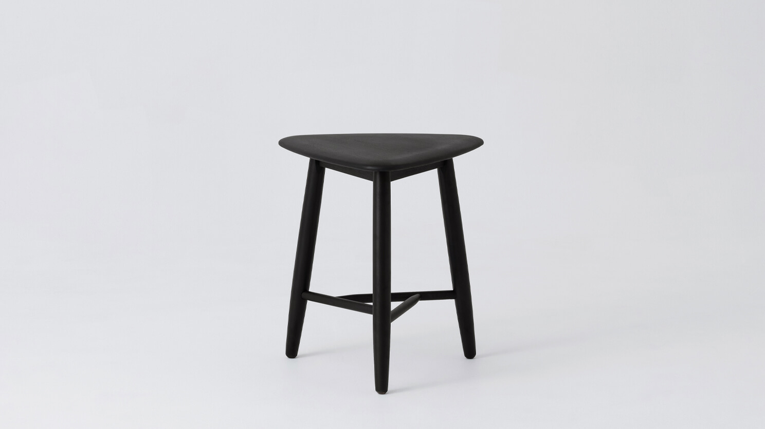 Side view of the Kacia modern end table in black