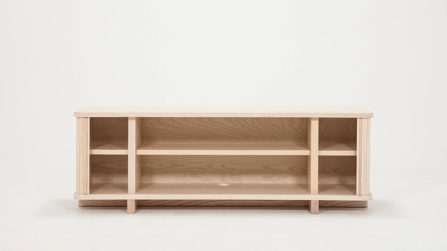 Front view of the Tambour modern credenza in ash with open drawers
