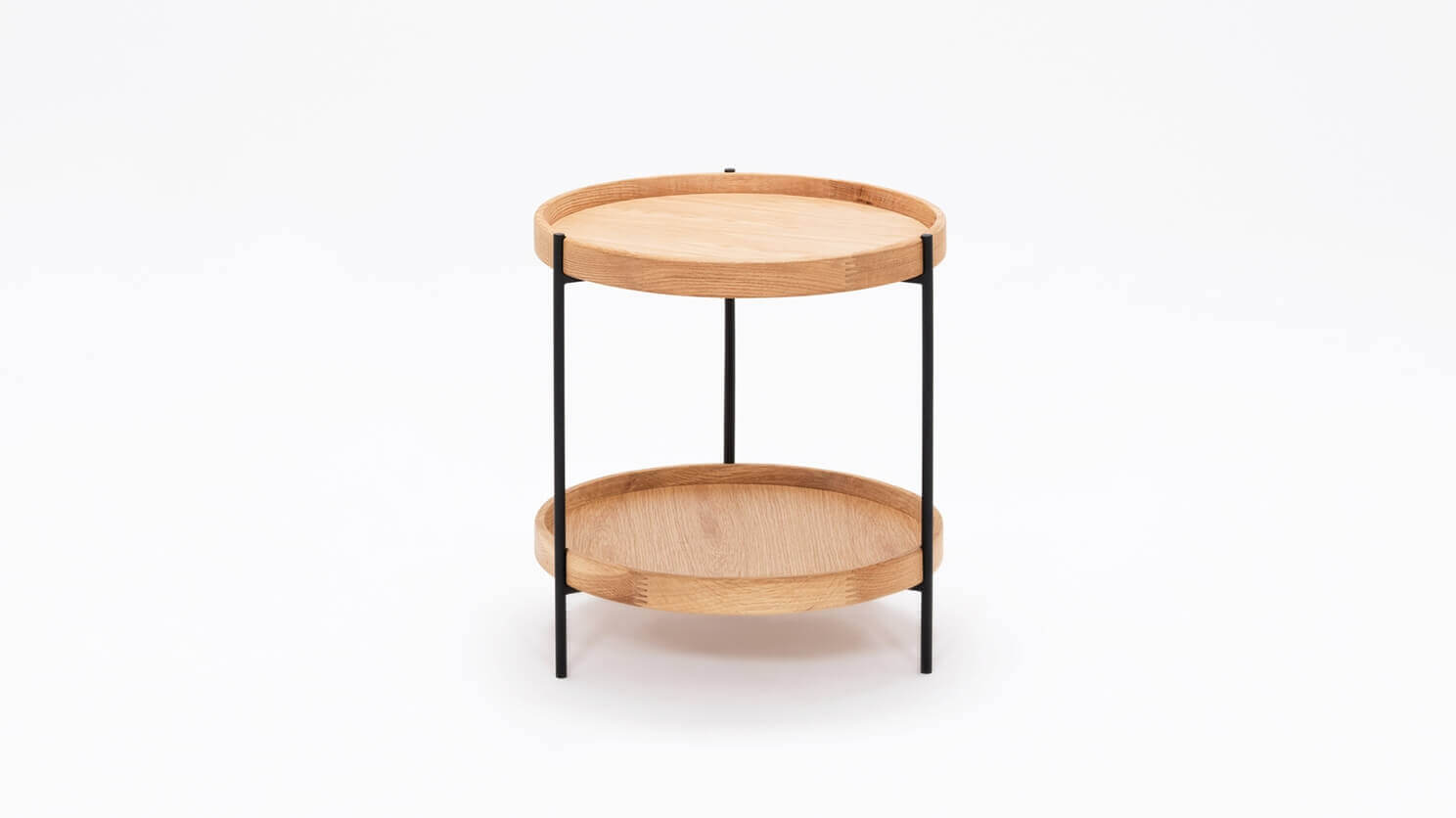 Front view of the Sage round end table in oak