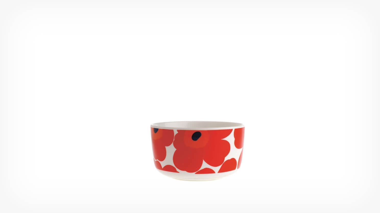 Side view of the Marimekko Oiva Unikko bowl in red, white, and black