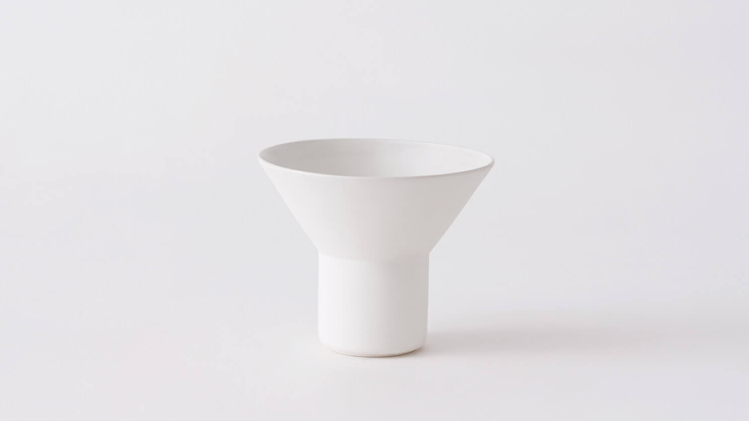 Front view of medium white ceramic vase