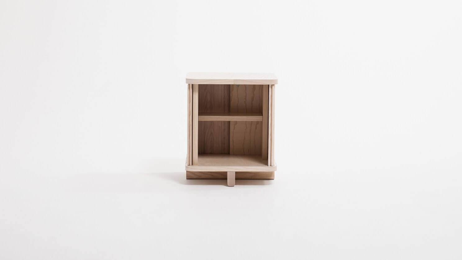 Front view of the Tambour modern end table in ash with drawer fully open