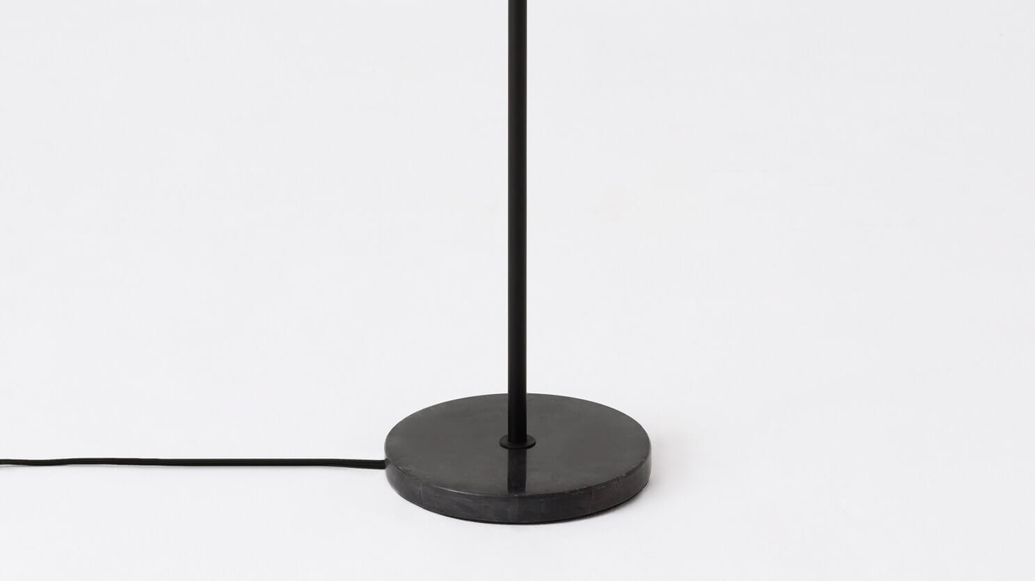 Detail view of the Grove Opal living room floor lamp black base