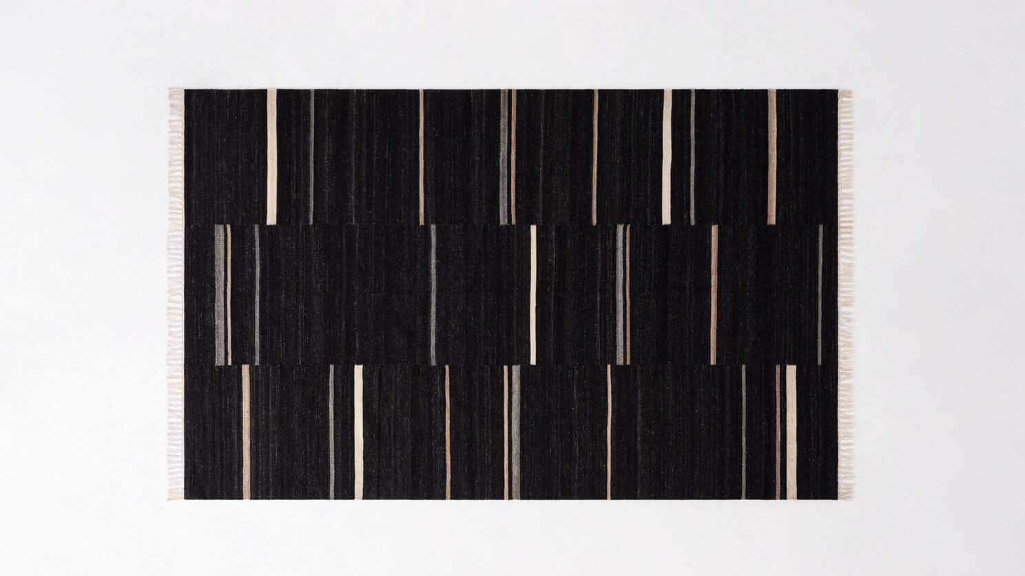 Overhead view of the Nomad kilim rug in black