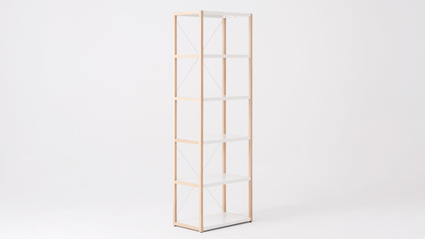 Angled view of the tall rectangular Grow minimalist bookcase in oak and white