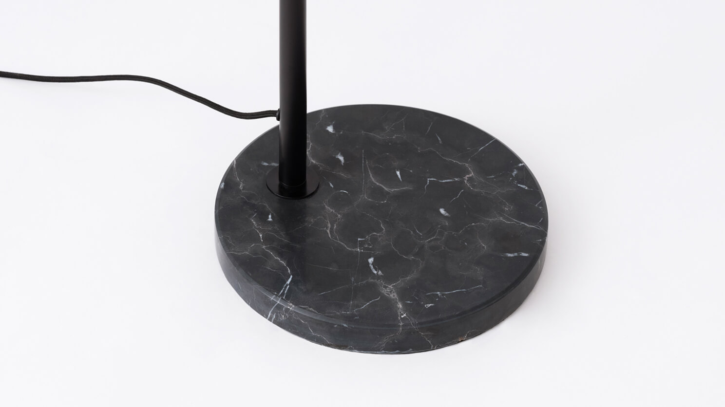 Detail view of the Oxford mid century floor lamp marble base in black