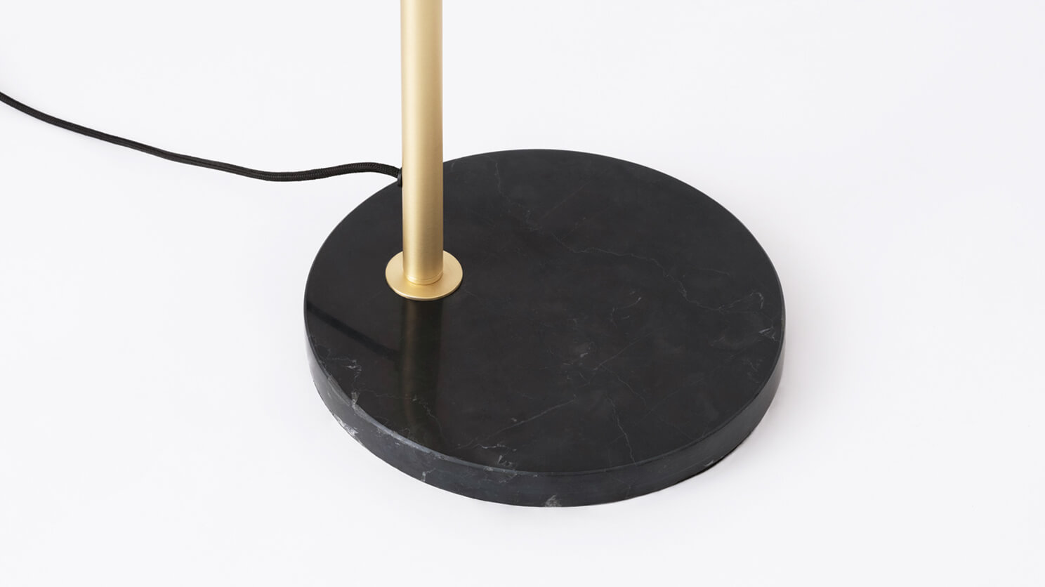 Detail view of the Oxford mid century floor lamp marble base in brass