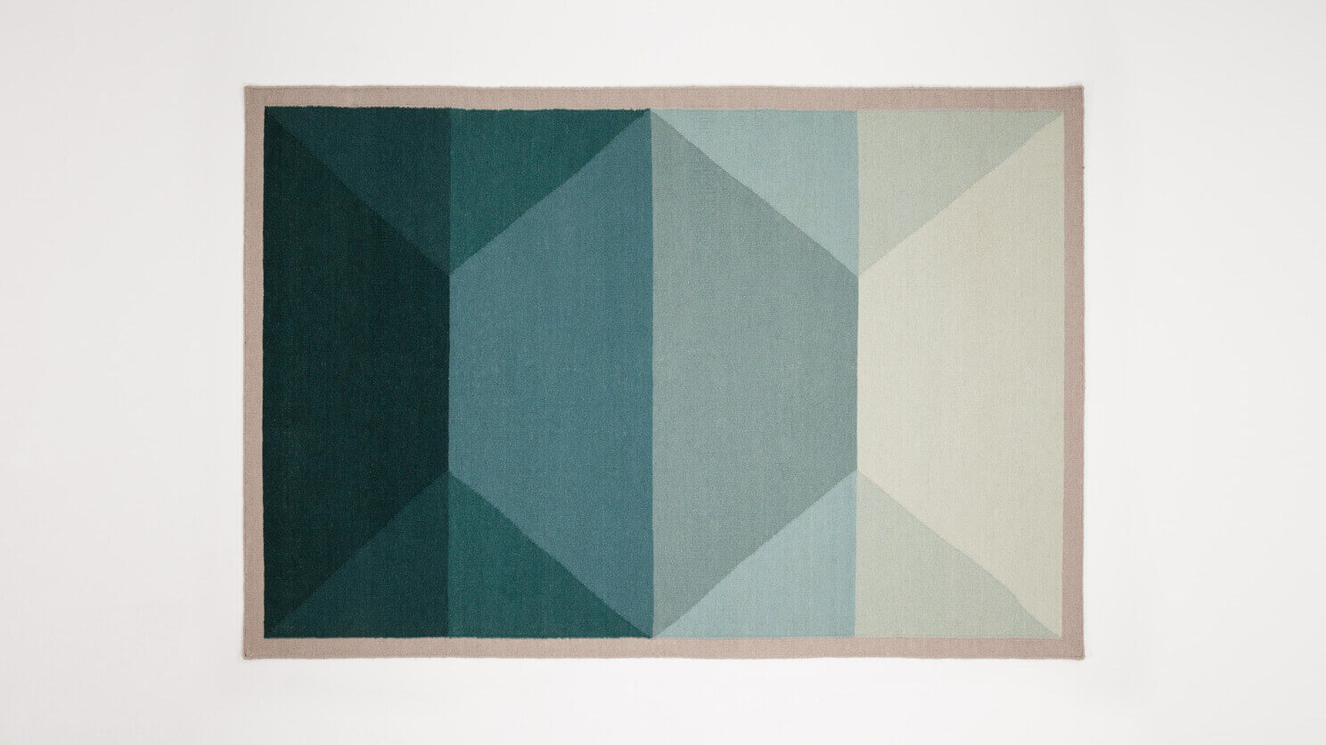 Overhead view of the modern handwoven wool rug in teal