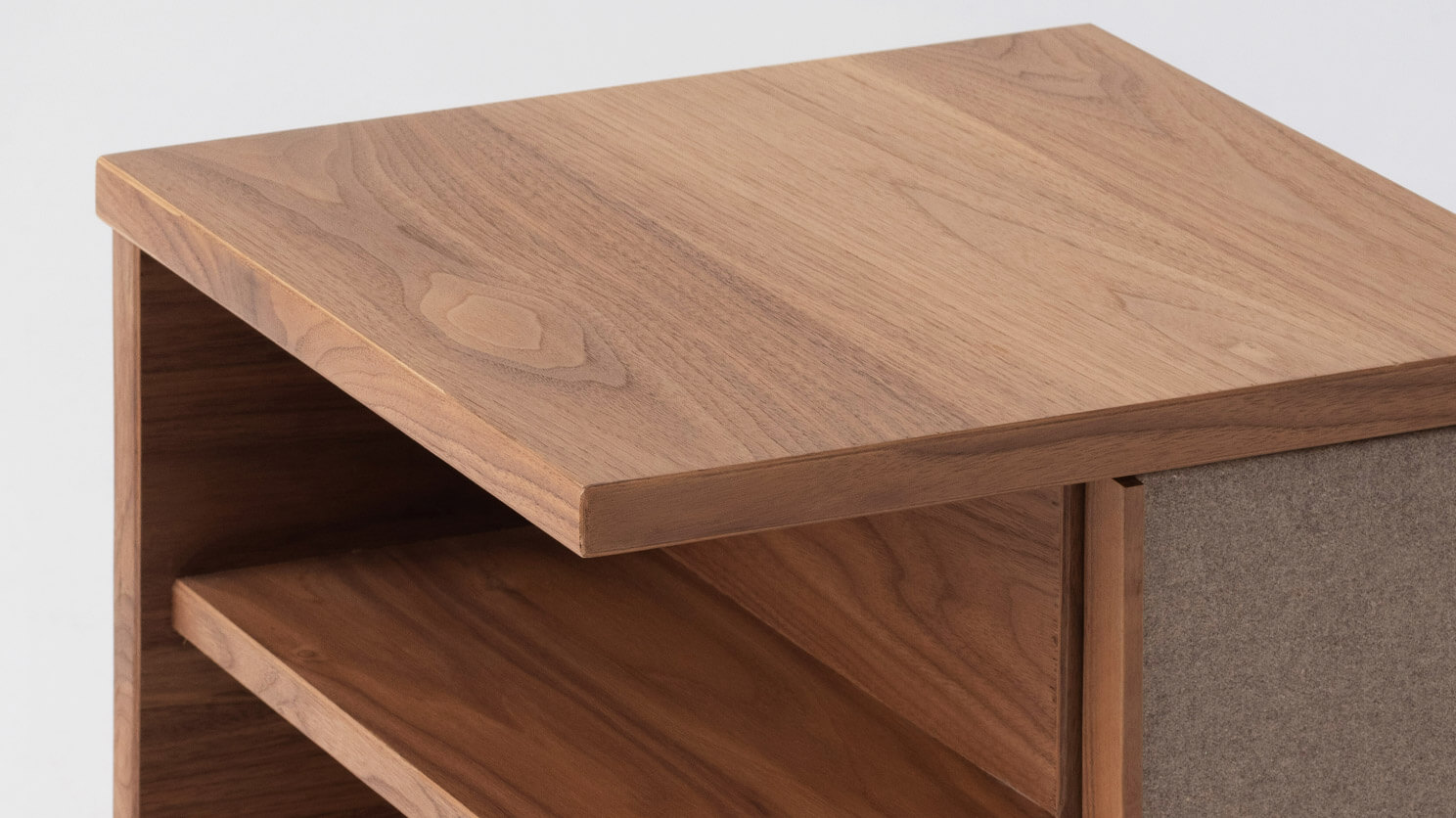 Detail right view of the Plank accent table canada in walnut with fabric panels