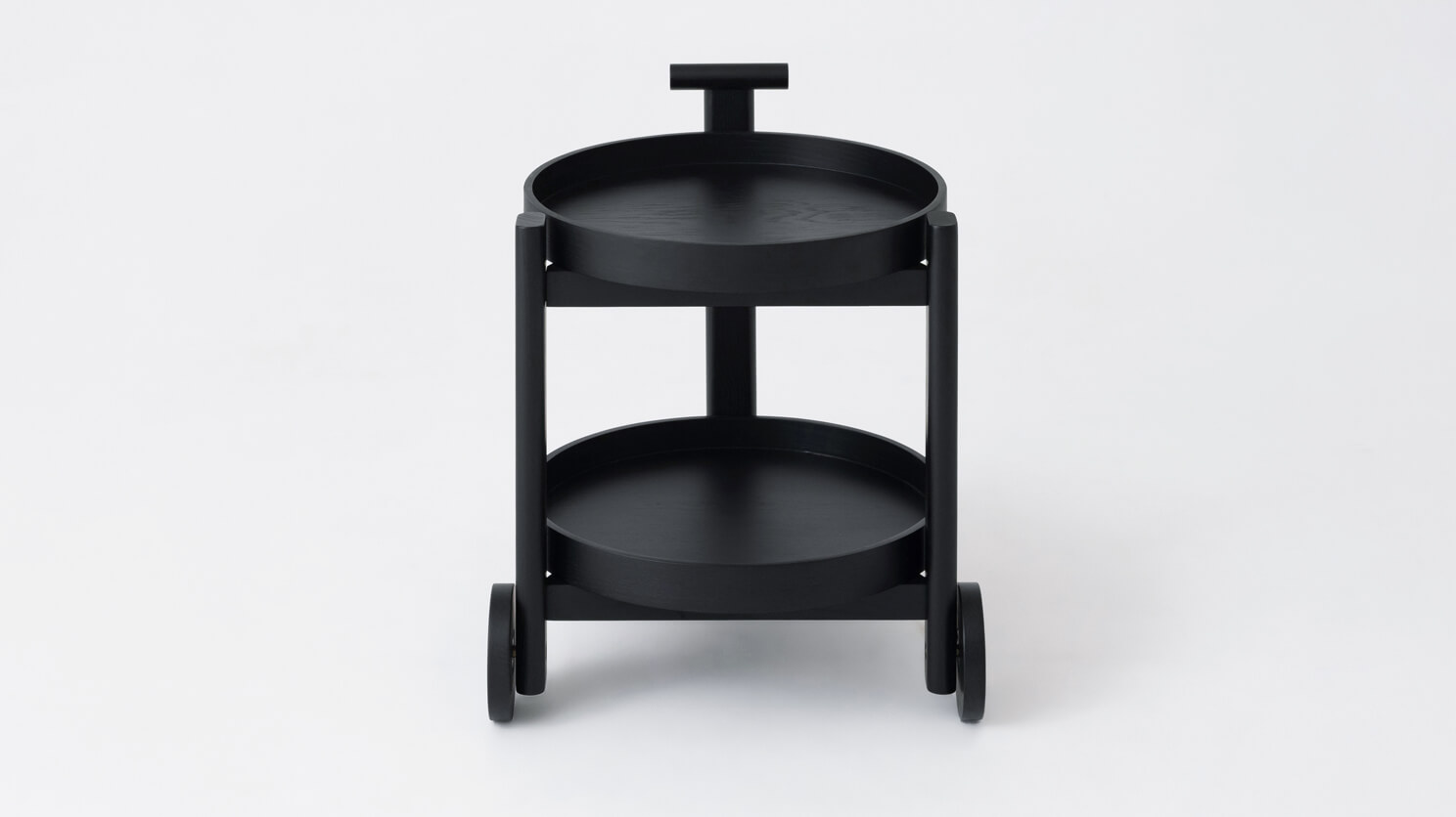 Front view of black oak bar cart