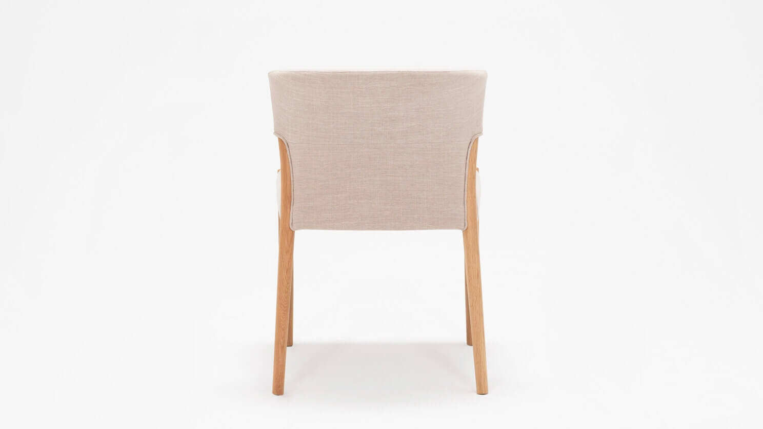 Back view of the Wren fabric dining chair in oak with upholstered back