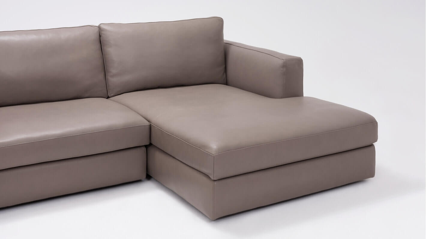 Detail view of the Cello modern sectional couch chaise in beige leather