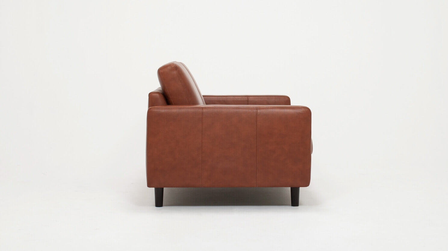 Side view of the Oskar modern loveseat in brown leather