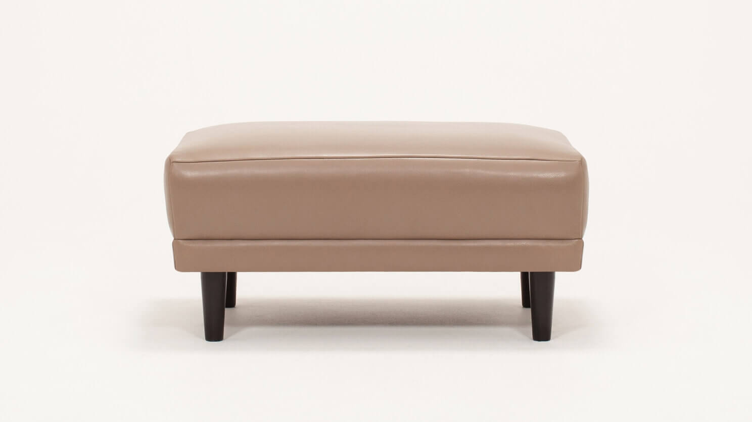 Front view of the Remi modern ottoman in beige leather