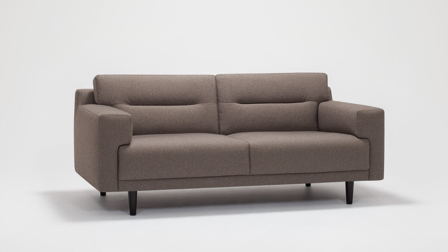 Angled view of the Remi modern loveseat with horizontal pull in grey fabric