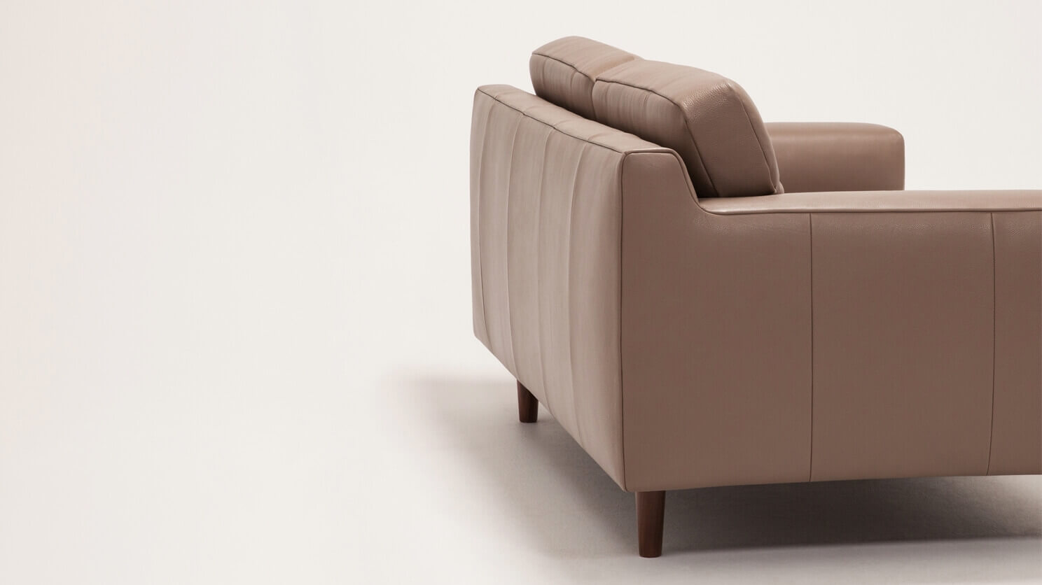 Side view of the Remi modern loveseat with horizontal pull in grey leather