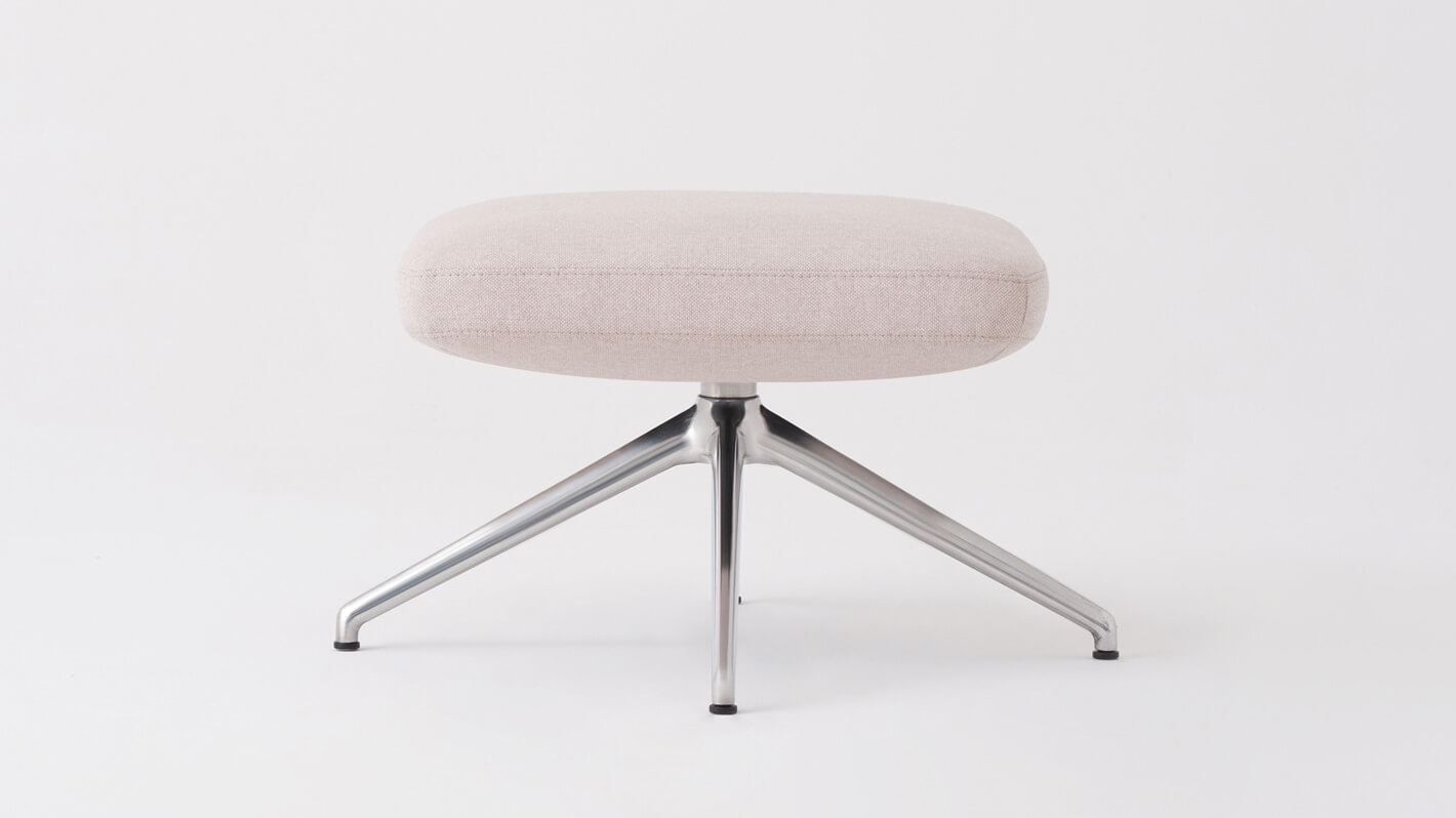 Front view of the Suite modern footrest in white fabric