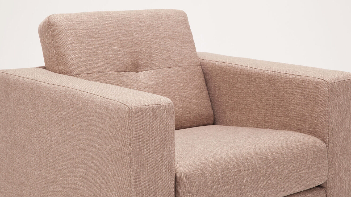 Detail view of the Solo modern lounge chair in beige fabric