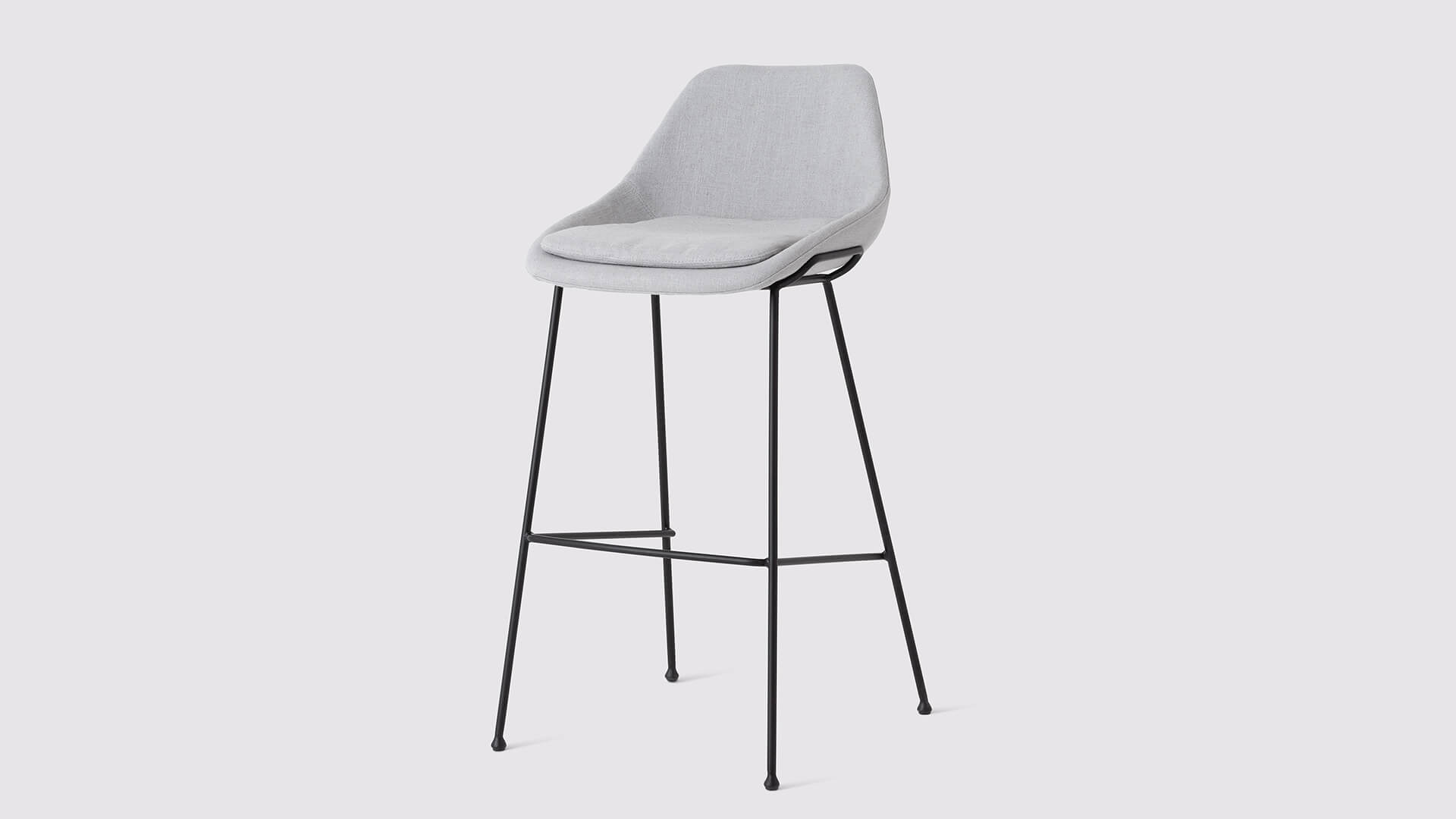 Front angled view of the Nixon custom bar stool in pale gray fabric