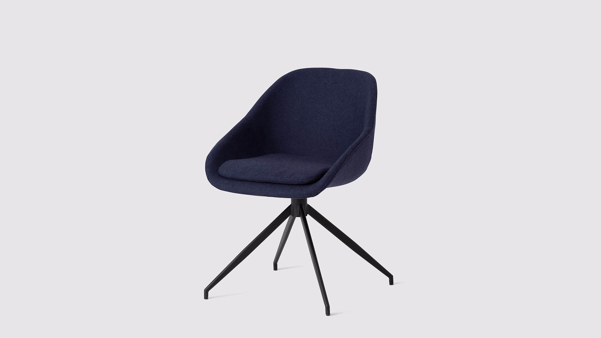 Front angled view of the Nixon custom modern dining chair in deep blue fabric