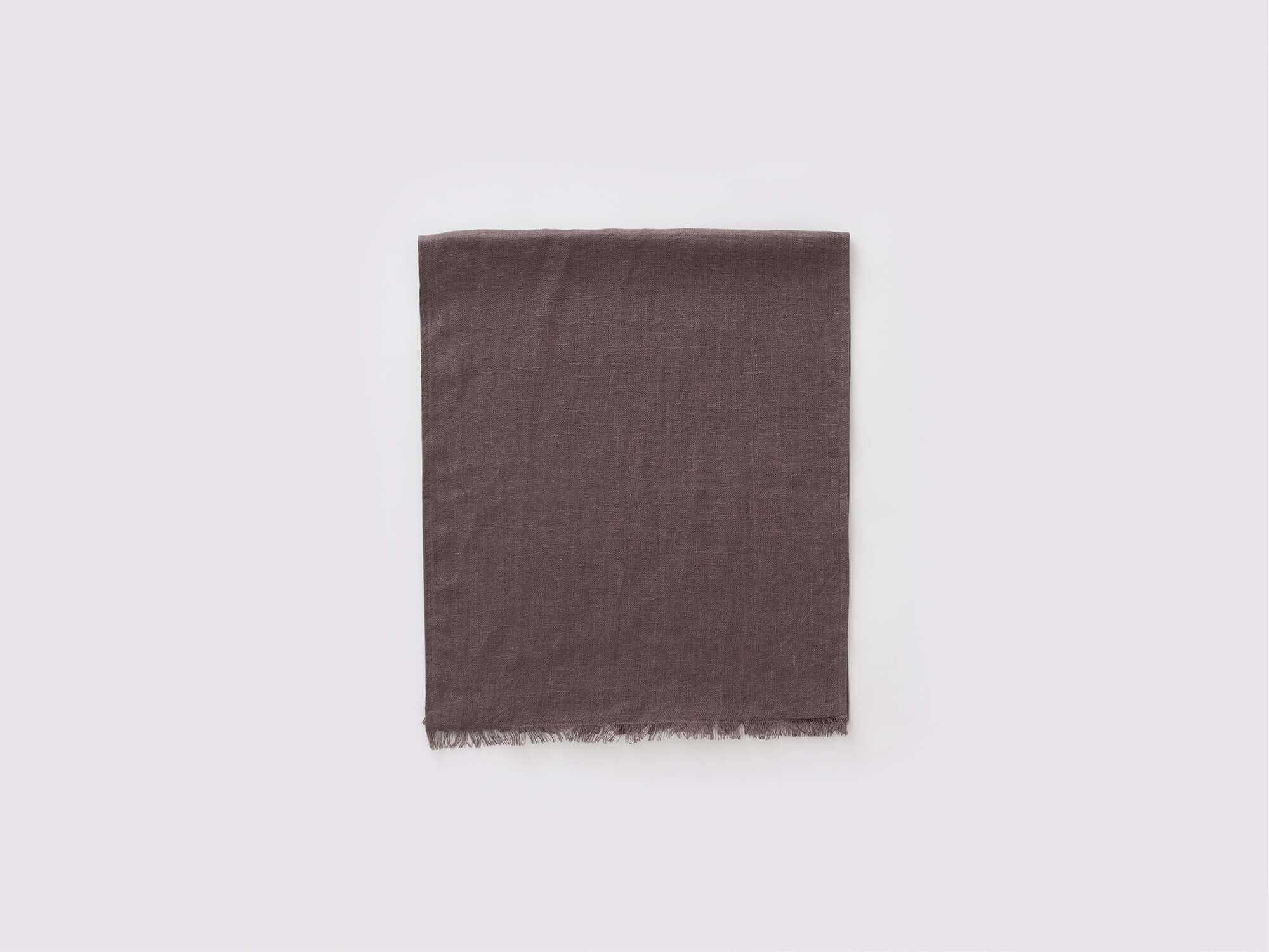 Overhead view of the Faye rustic table runner in grey