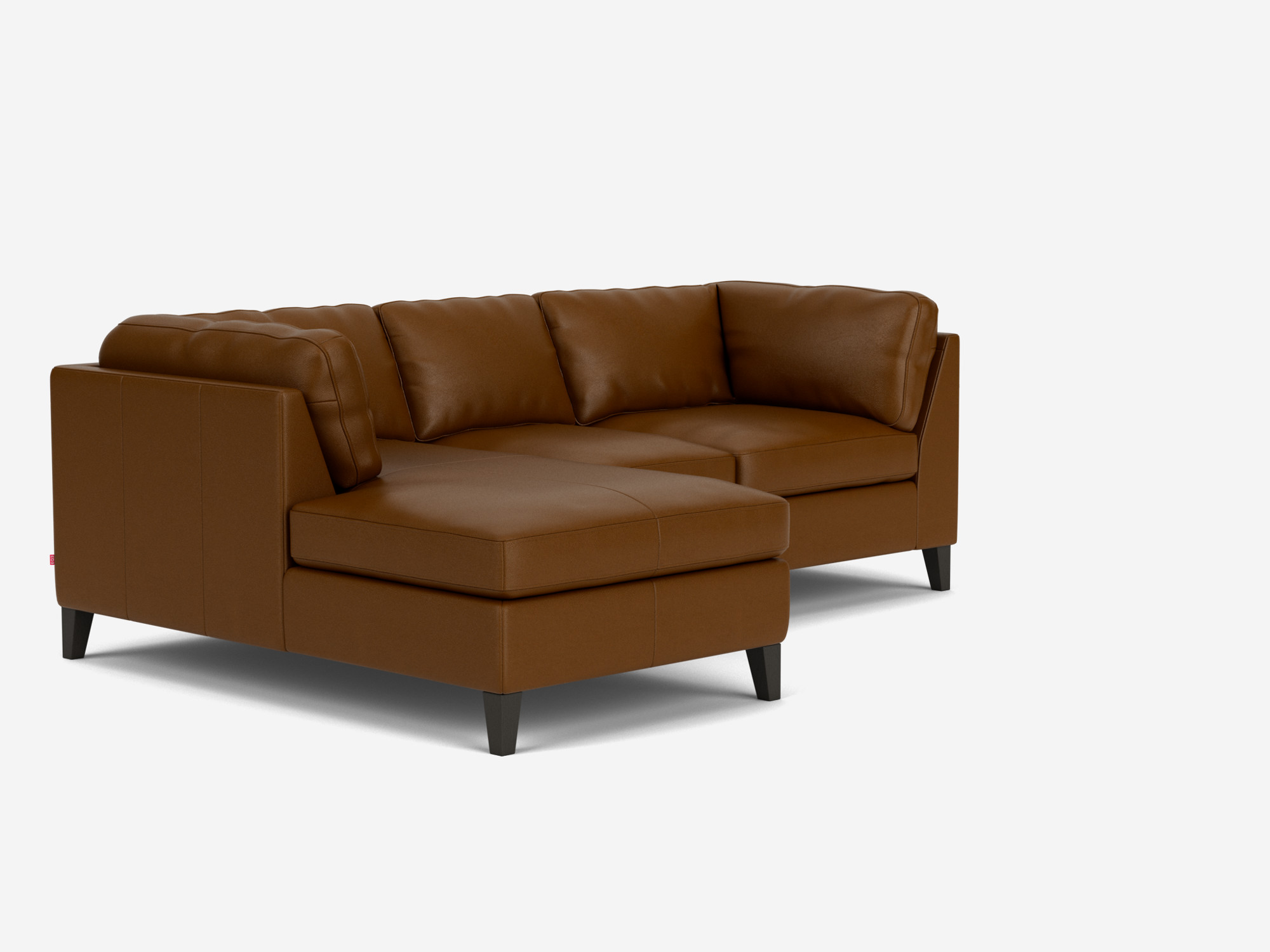 Angled view of the Salema modern sectional couch in brown leather with right hand chaise