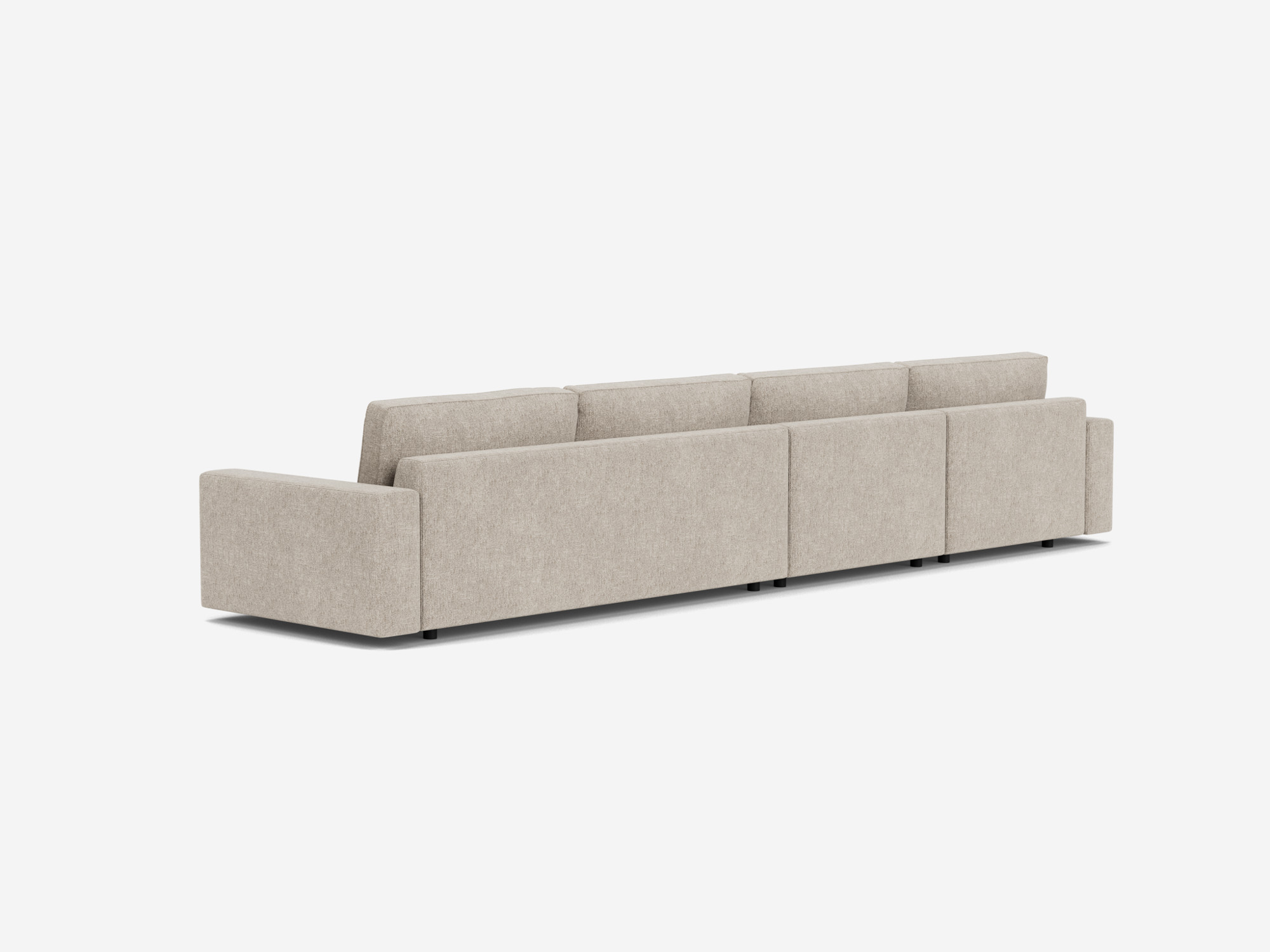 Back view of the modular sofa in light grey fabric with left hand chaise