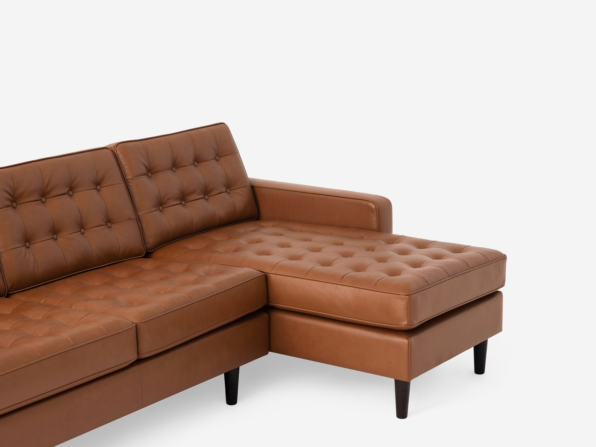 Detail view of the  Reverie modern sectional sleeper sofa in brown leather