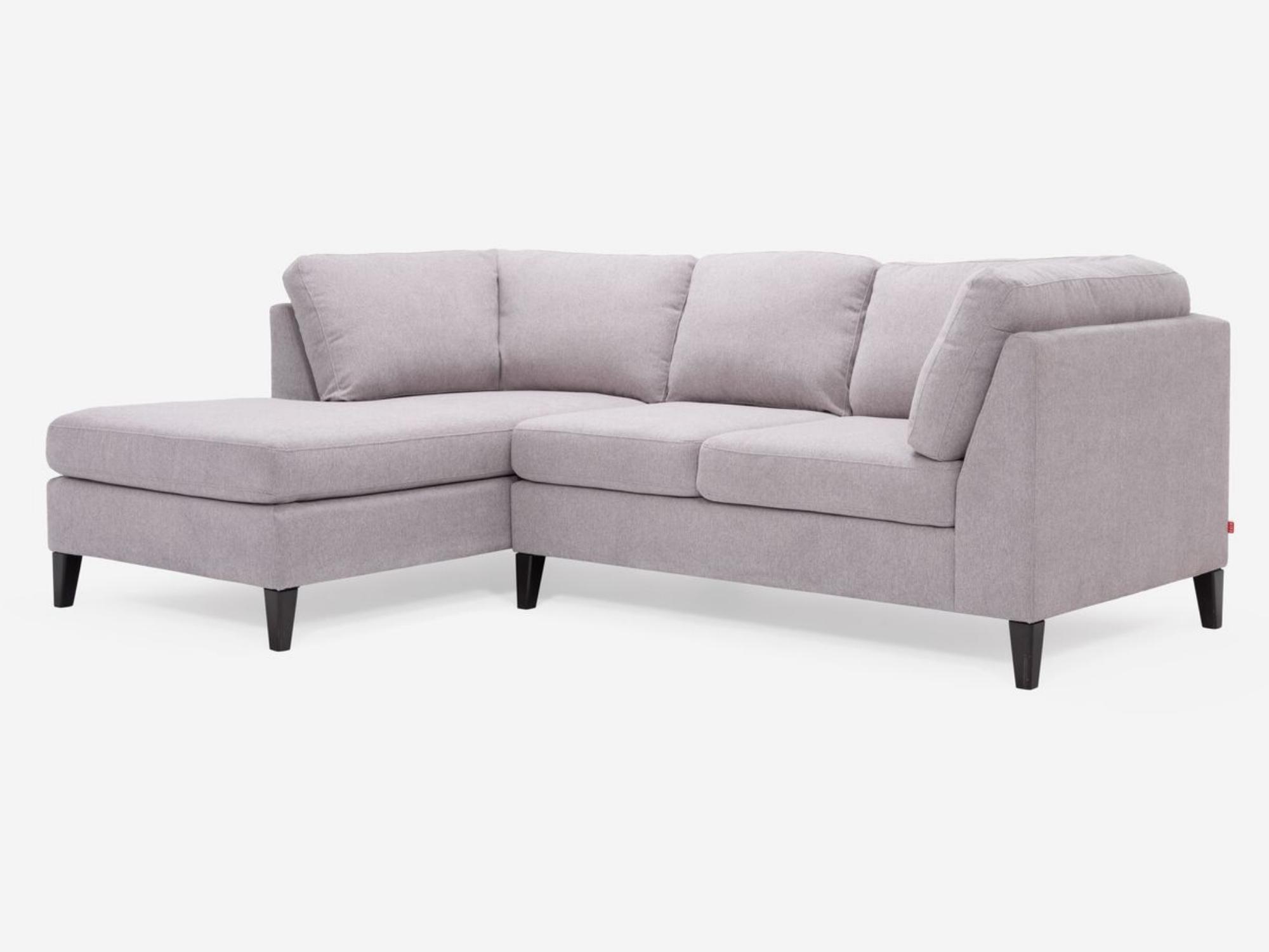 Corner view of the Salema modern sectional couch in grey fabric