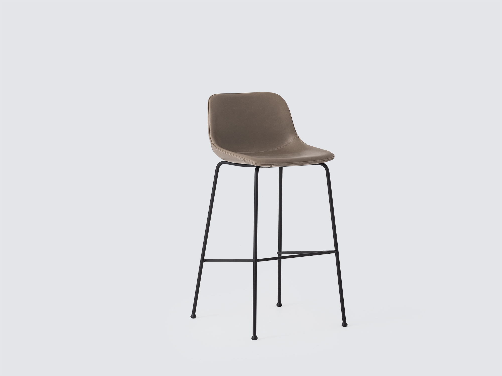 Angled view of the Oles counter height bat stool with grey leather seat