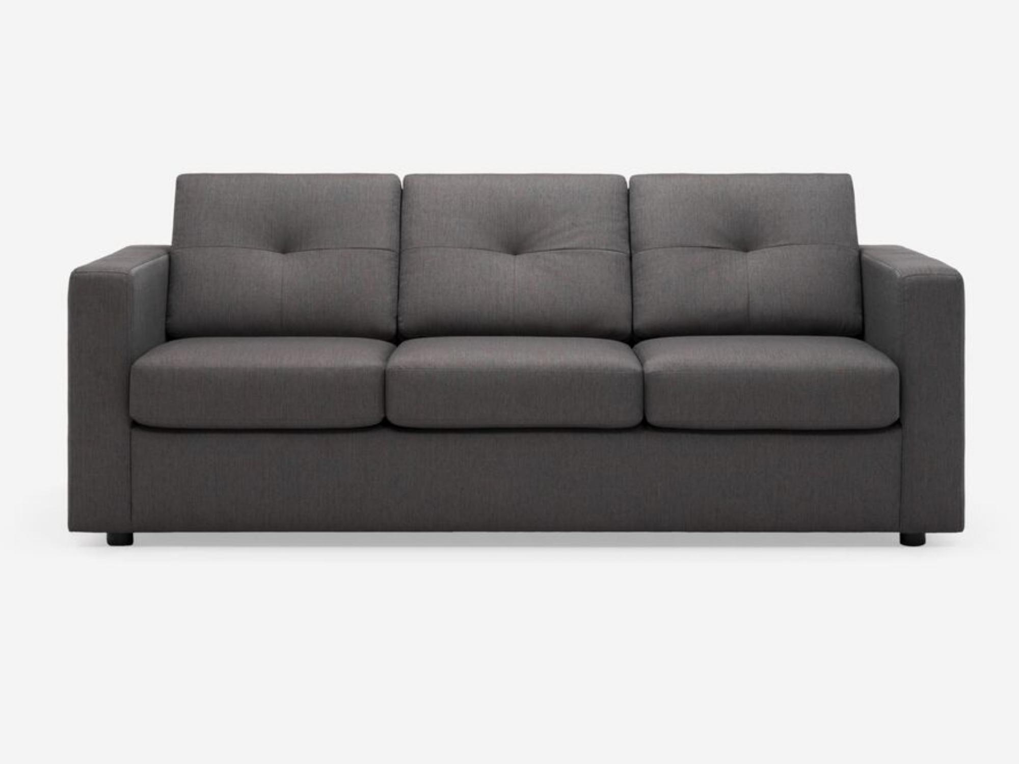 Front view of the Solo sofa bed in dark grey fabric