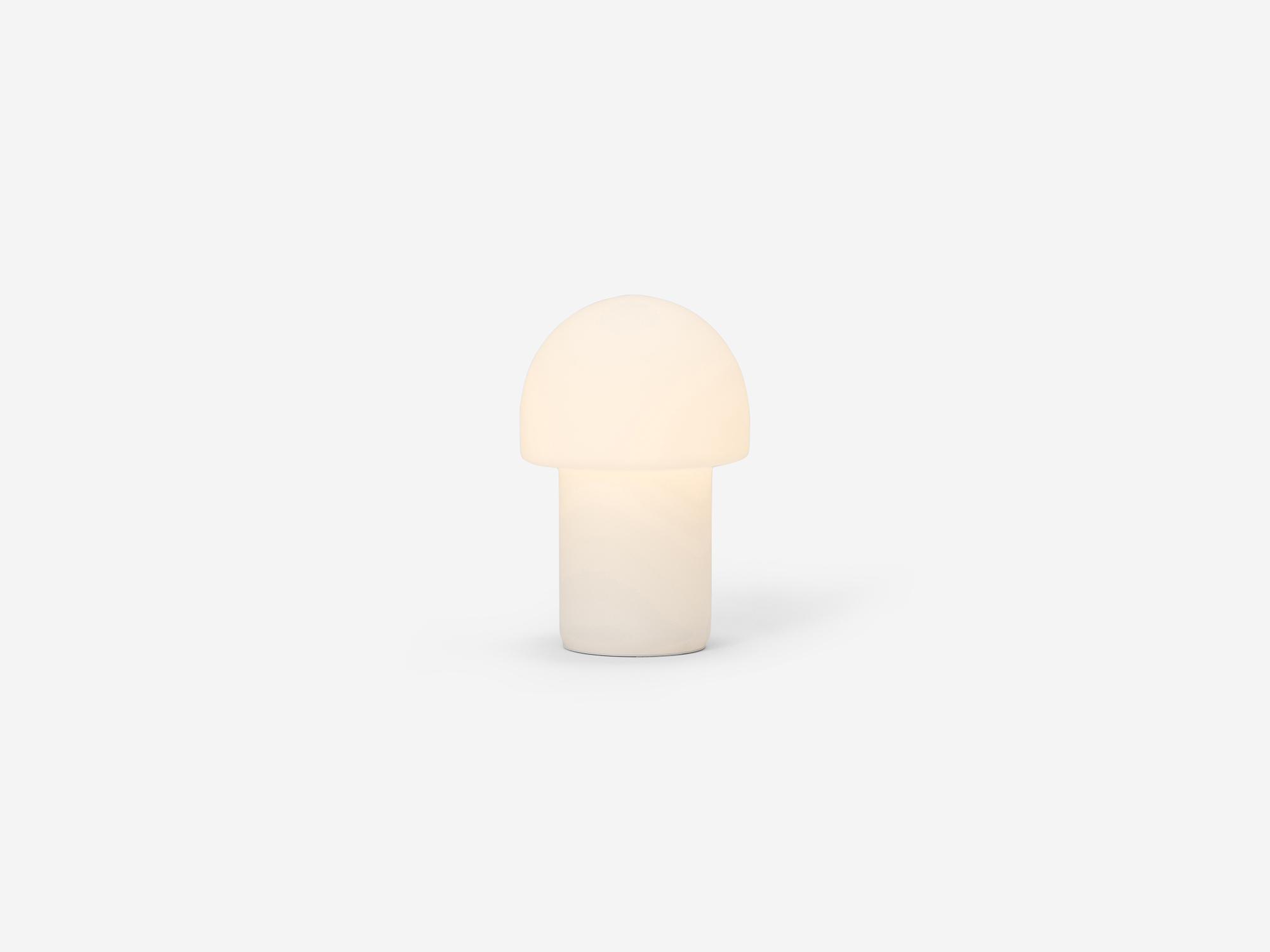 Large mushroom shaped table lamp with light on