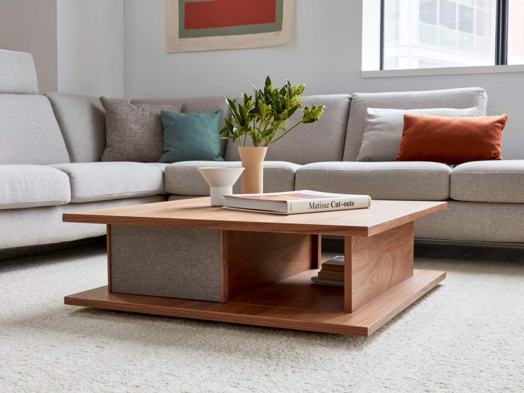 Two flower vases on a modern coffee table