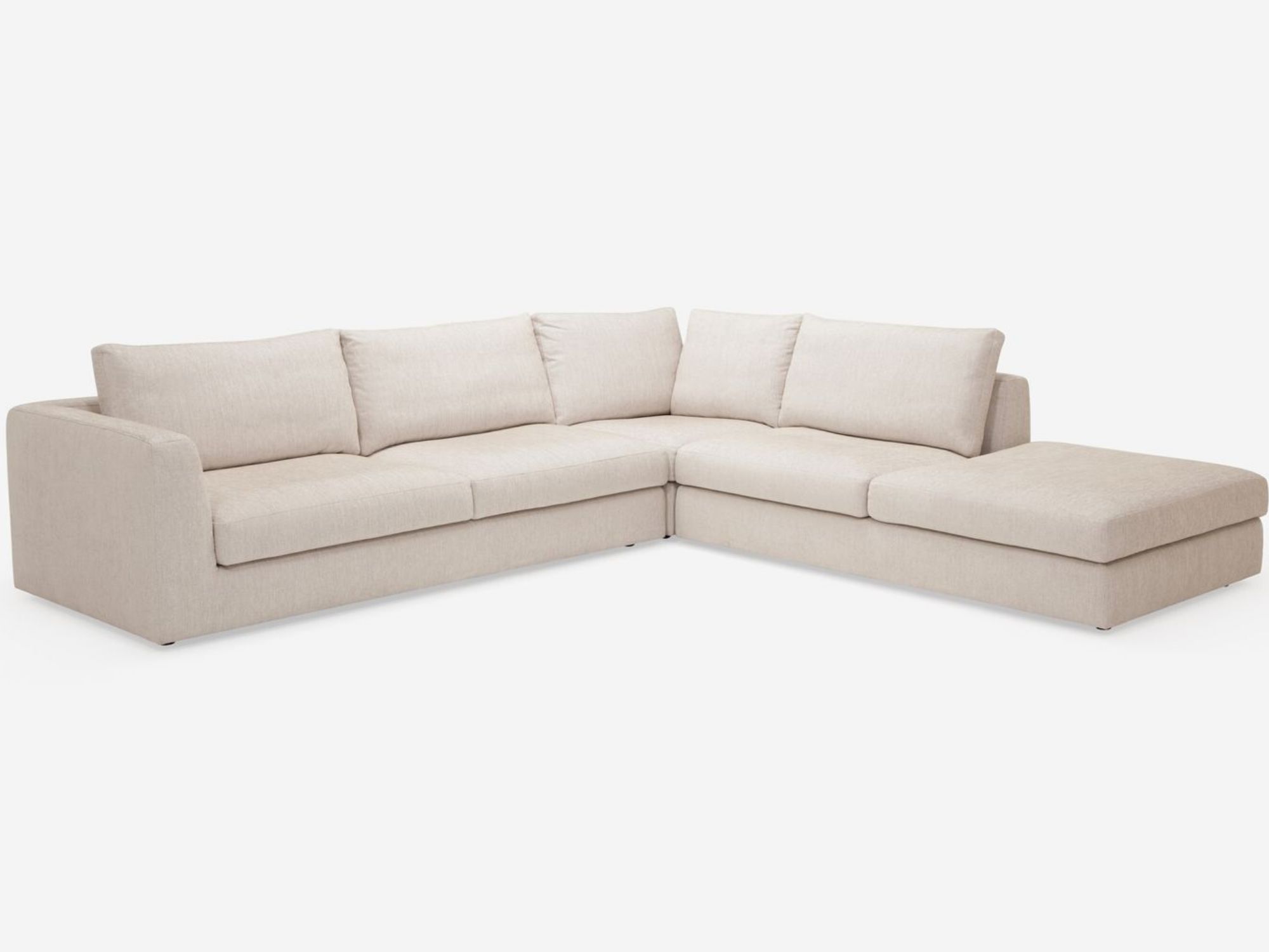 Front view of the Cello modern sectional couch in white fabric with right hand backless chaise