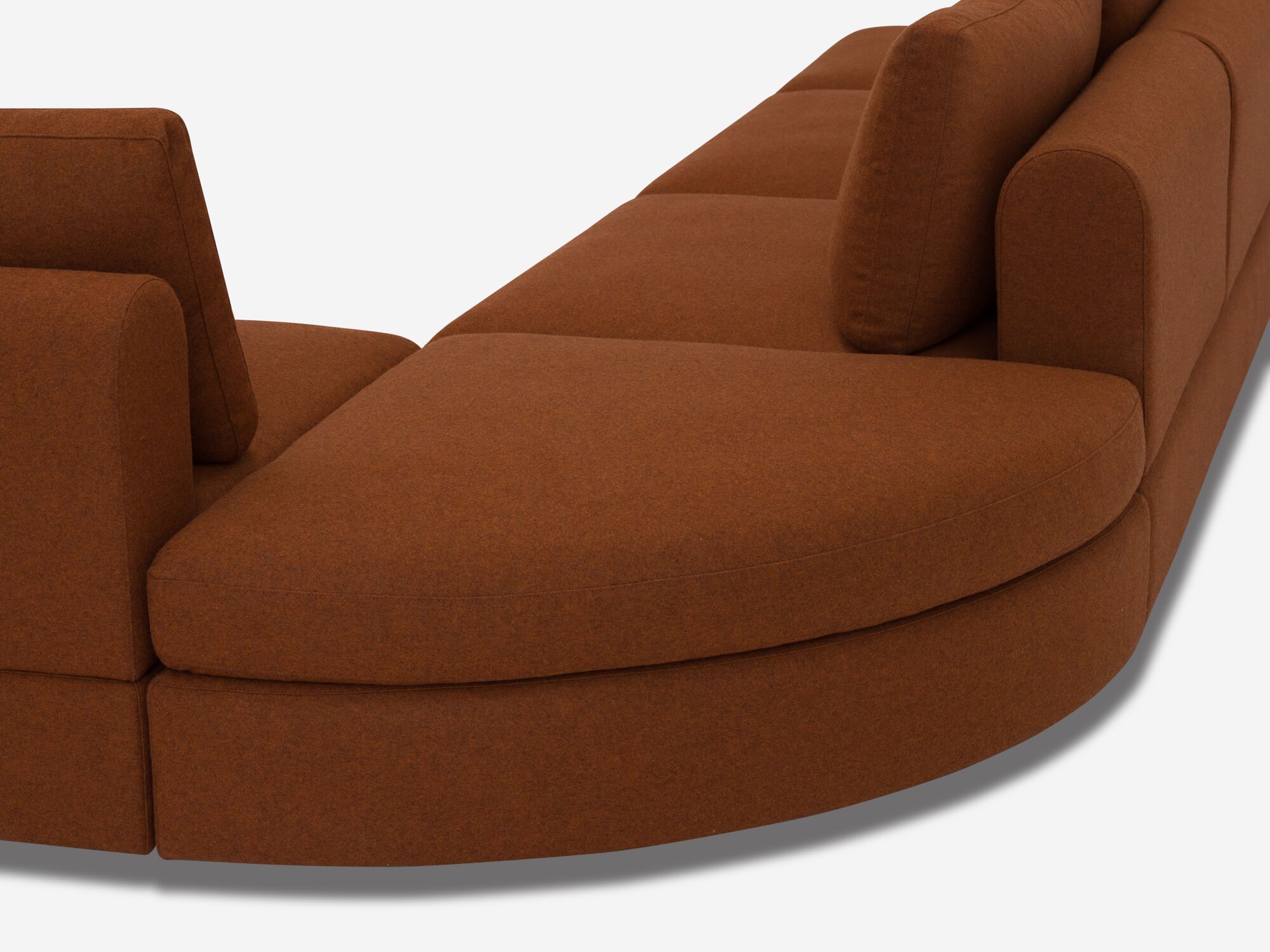 Burnt orange sectional sofa back detail view