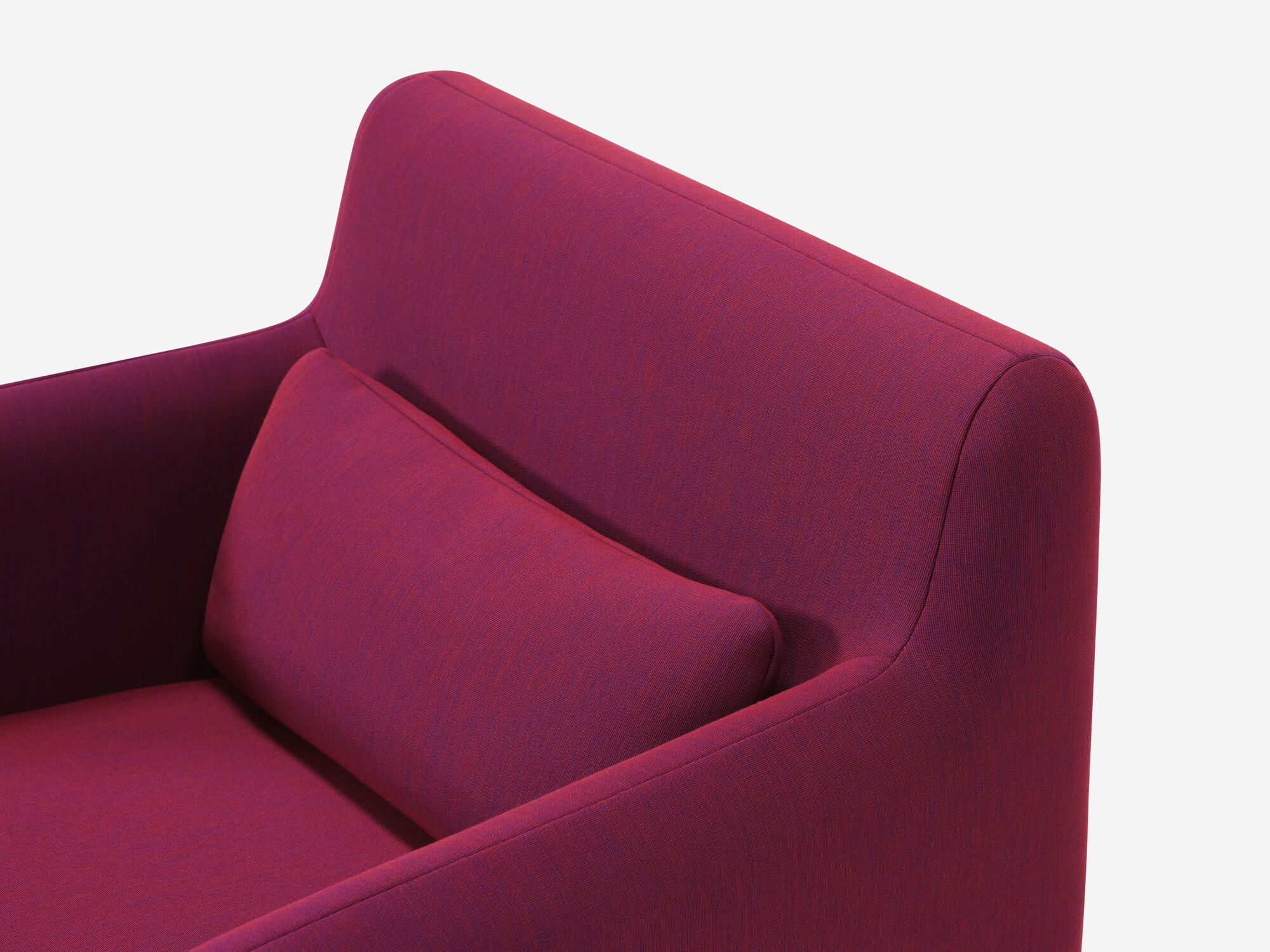 Organic shaped red armchair detail view