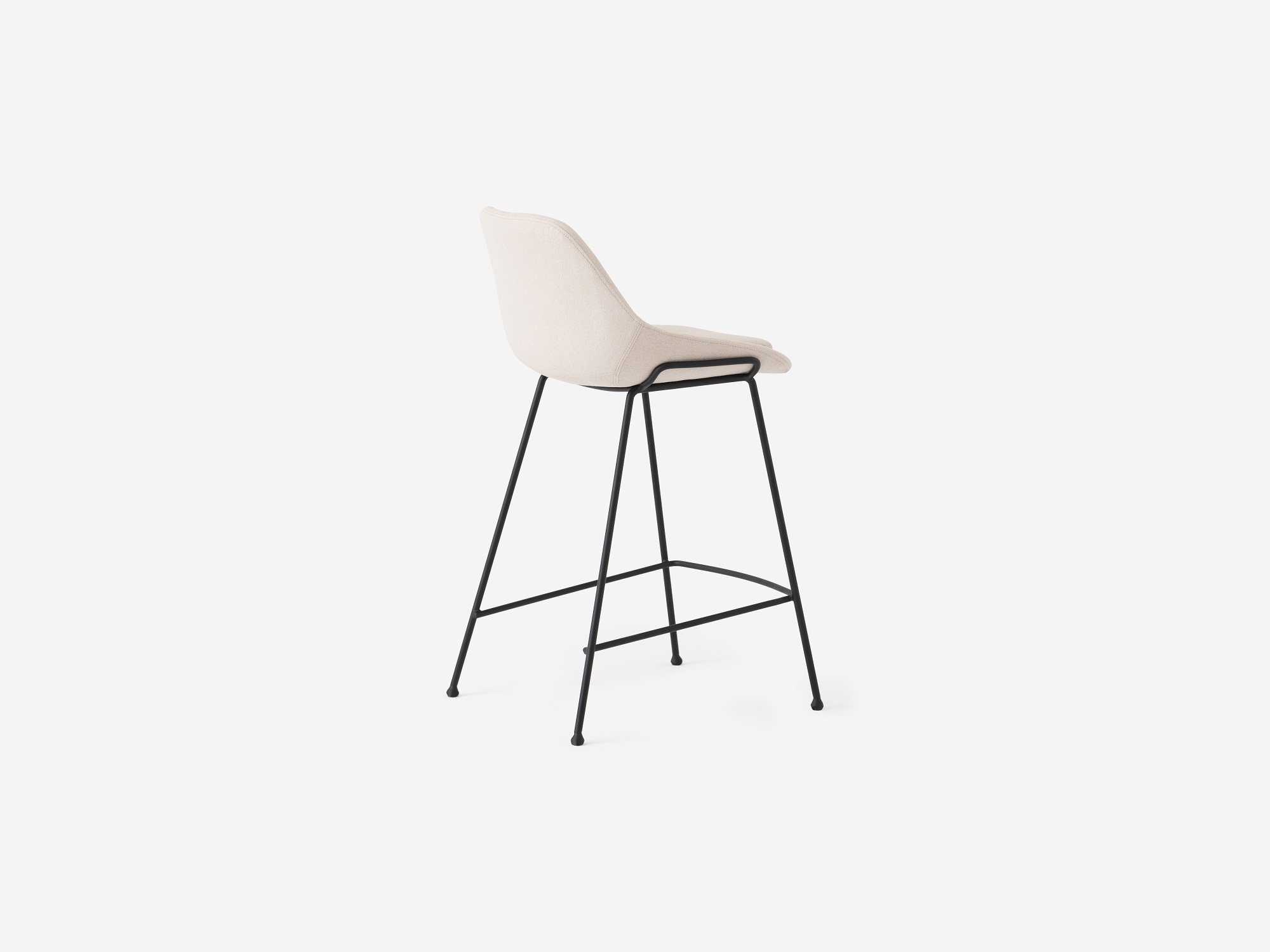 Back angled view of the Nixon counter stool in white fabric