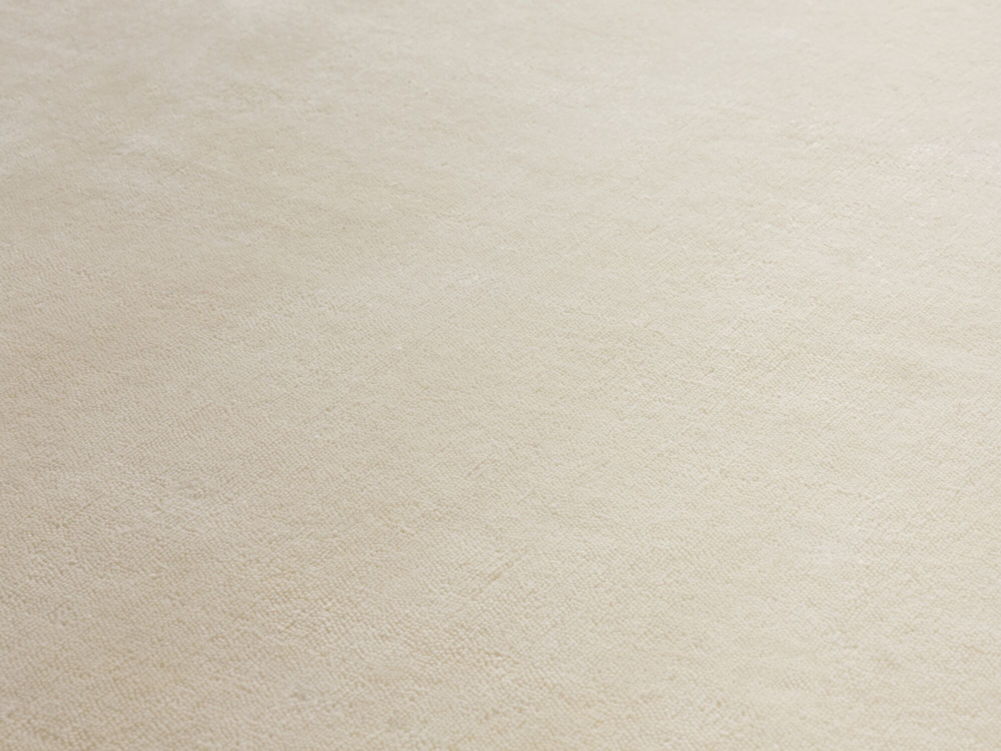 Durable cream area rug detail view