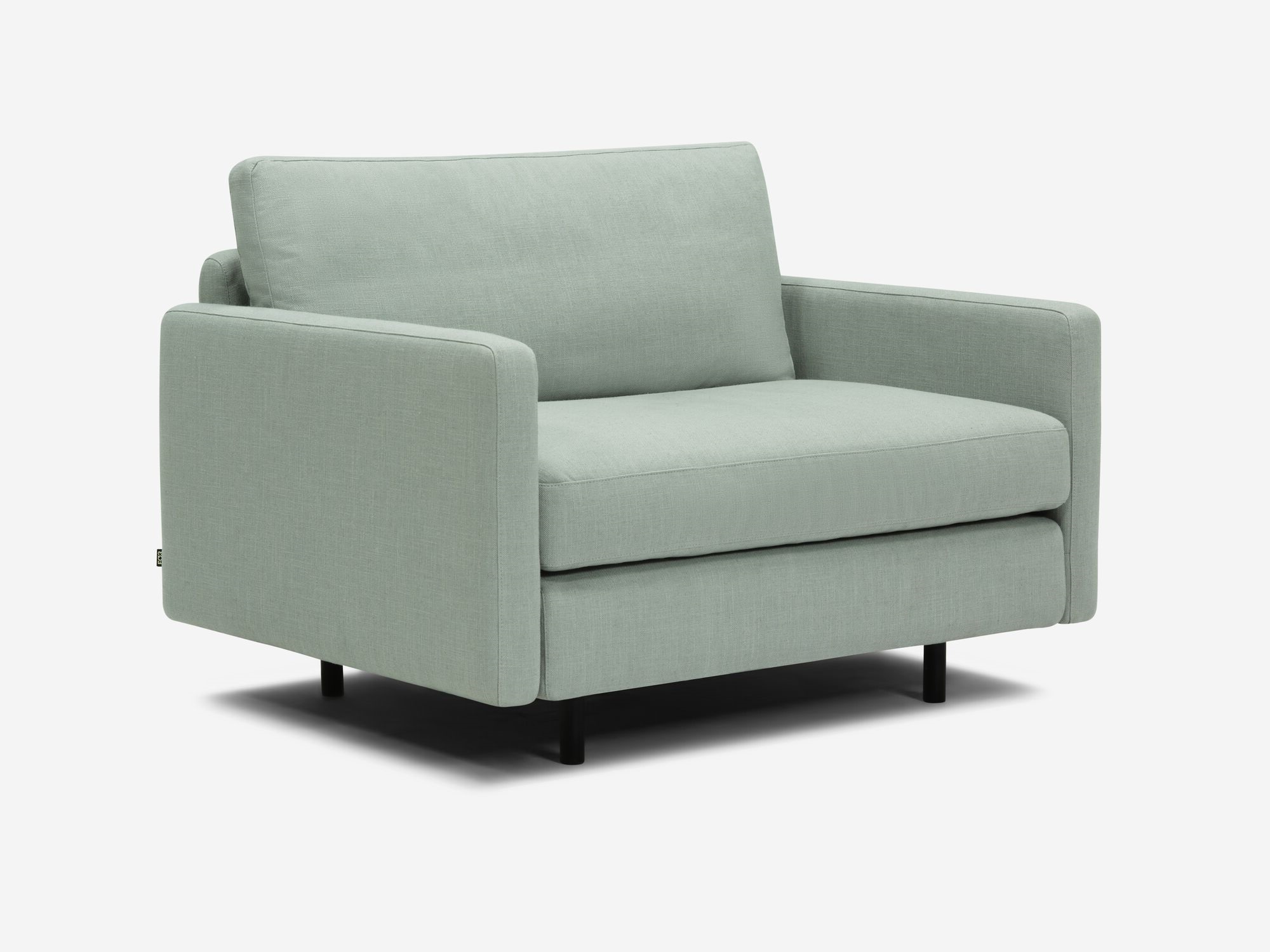 Wide teal armchair front angle view