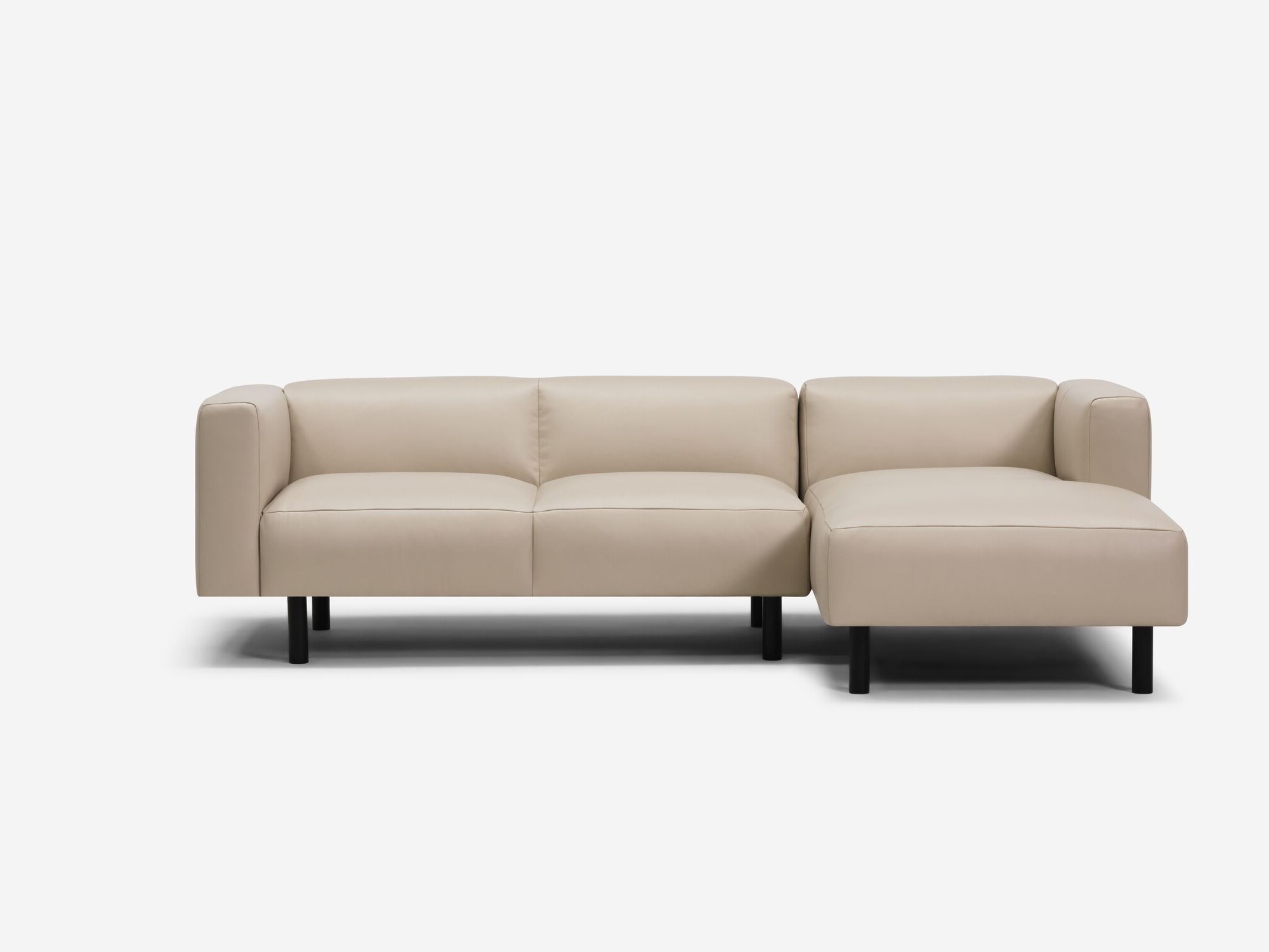 Beige leather sectional with right chaise front view