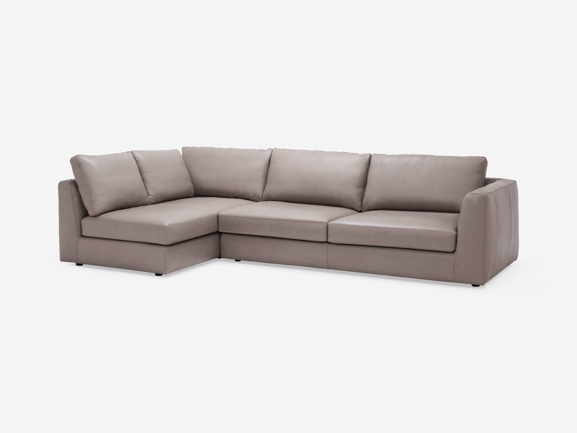 Angled view of the Cello modular sofa in beige leather left hand facing