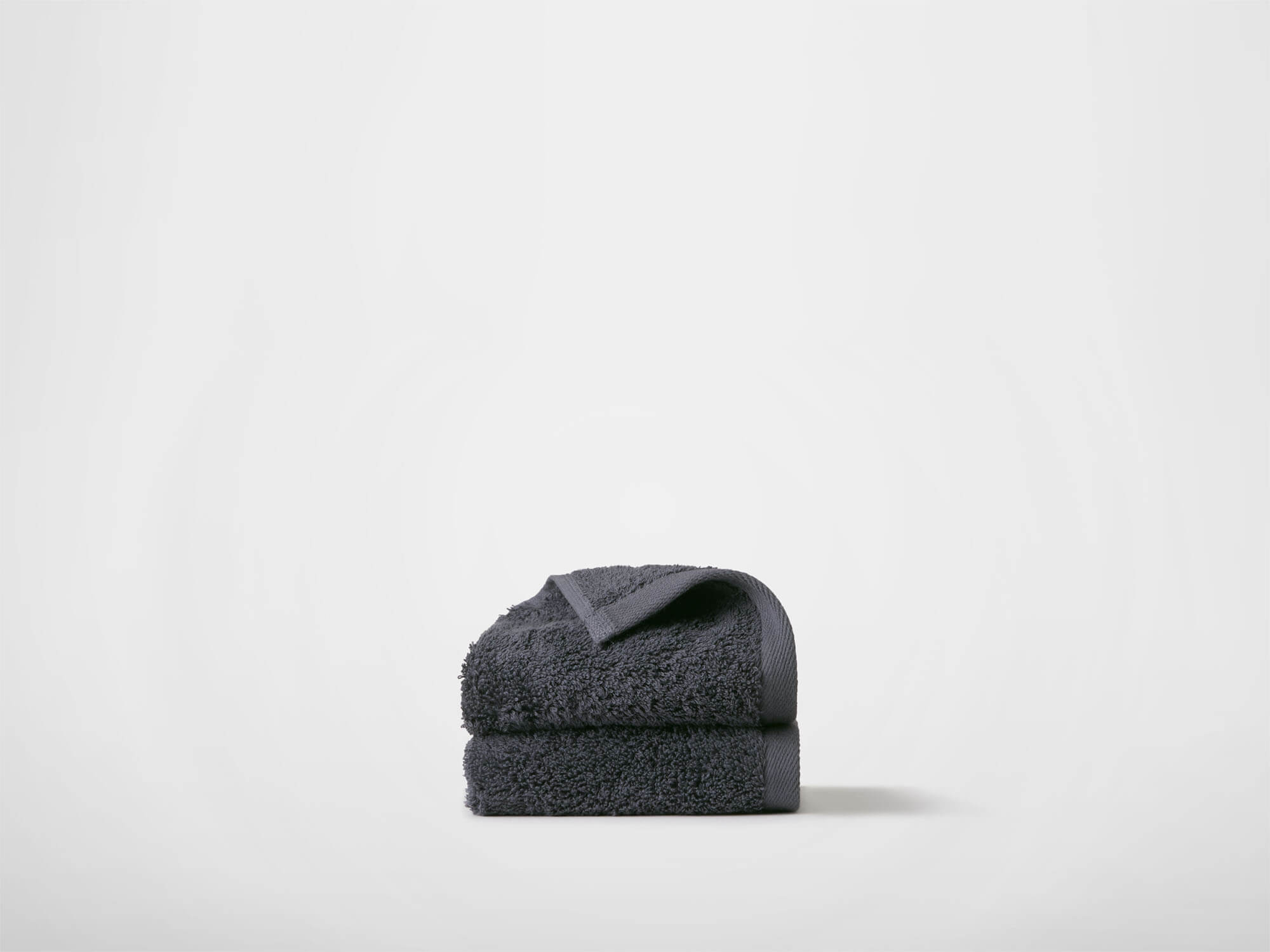 Side view of dark grey washcloths
