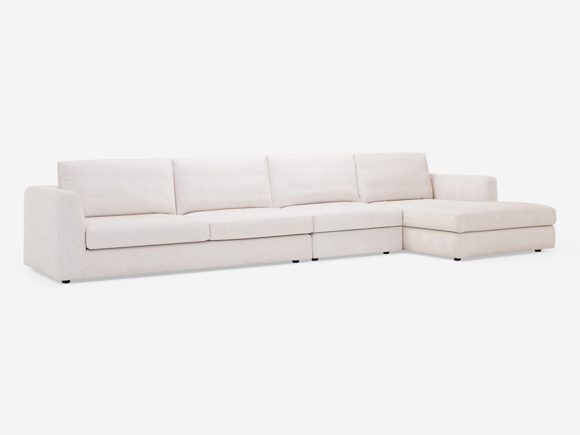 Corner view of the Cello modular sofa in white fabric with right hand chaise